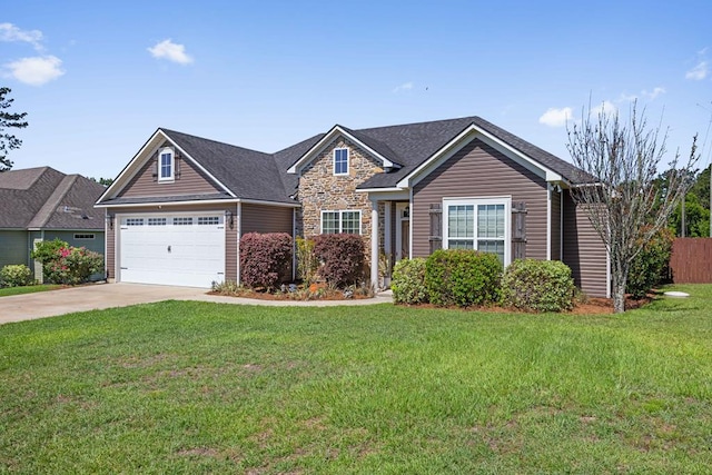 4186 Bowen Way, Valdosta, GA 31605 - view of front of home with driveway, a garage, and stone siding