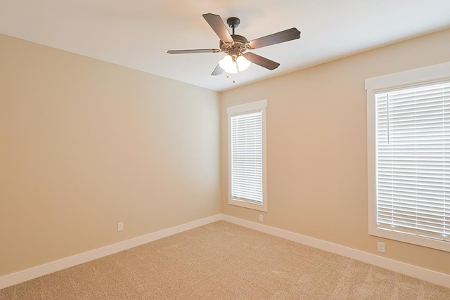 2830 Loch Laurel Rd, Valdosta, GA 31601 - spare room with light carpet, baseboards, and a ceiling fan