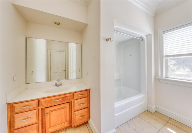 8262 Troupeville Rd, Valdosta, GA 31602 - bathroom featuring ornamental molding, vanity, tile patterned floors, baseboards, and shower / washtub combination
