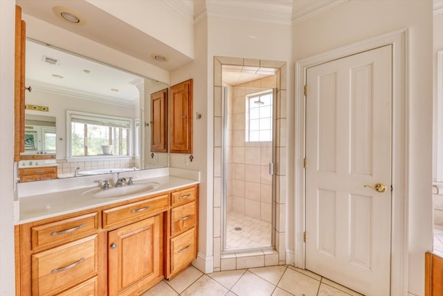 8262 Troupeville Rd, Valdosta, GA 31602 - bathroom featuring vanity, a shower stall, plenty of natural light, crown molding, and tile patterned flooring