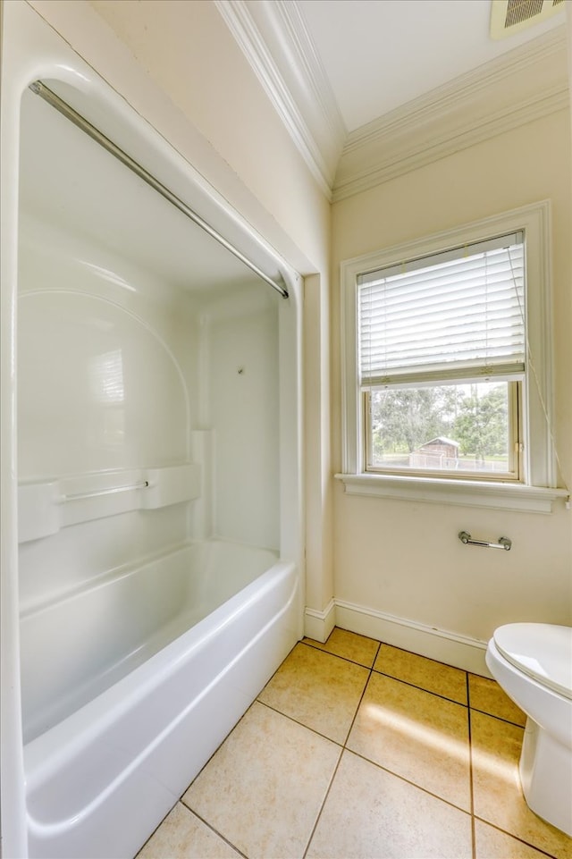 8262 Troupeville Rd, Valdosta, GA 31602 - bathroom with crown molding, tile patterned floors, toilet, baseboards, and bathing tub / shower combination