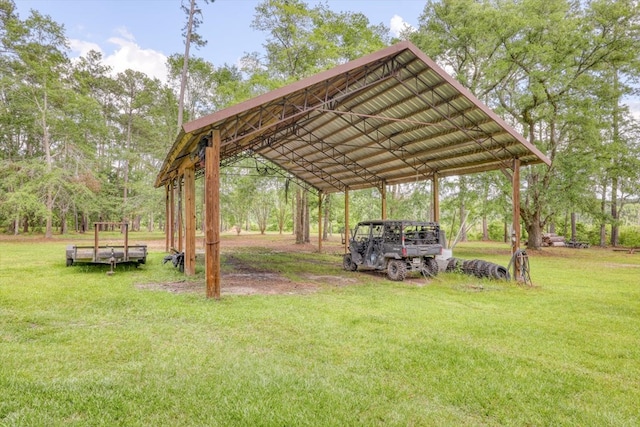 8262 Troupeville Rd, Valdosta, GA 31602 - surrounding community with a lawn and a detached carport