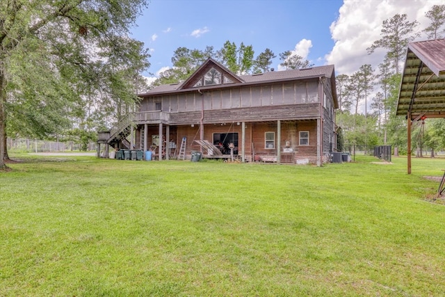 8262 Troupeville Rd, Valdosta, GA 31602 - rear view of house featuring a deck and stairs