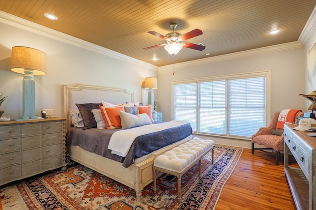 bedroom with ornamental molding, recessed lighting, hardwood / wood-style flooring, and wood ceiling