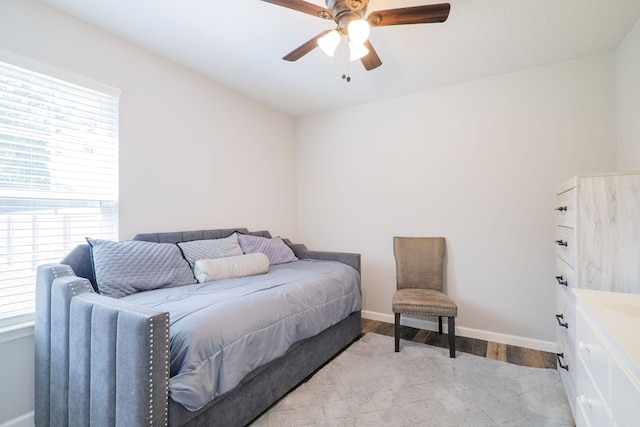 bedroom featuring ceiling fan and light hardwood / wood-style flooring