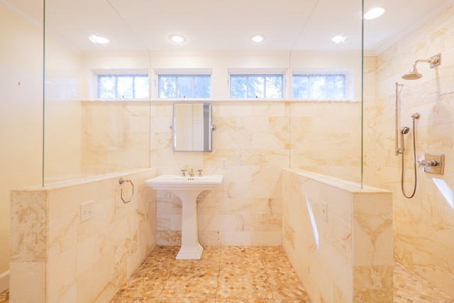 full bathroom with recessed lighting, crown molding, tile walls, and a walk in shower