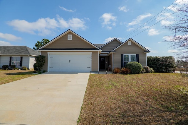 view of front facade featuring a garage and a front yard