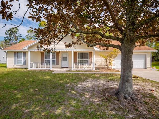 5210 N Northridge Rd, Valdosta, GA 31605 - view of front of property with a porch, a front yard, concrete driveway, and an attached garage