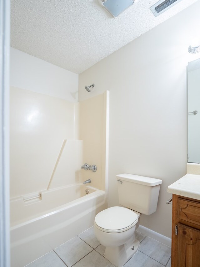 5210 N Northridge Rd, Valdosta, GA 31605 - bathroom featuring a textured ceiling, visible vents, toilet, vanity, and tile patterned flooring