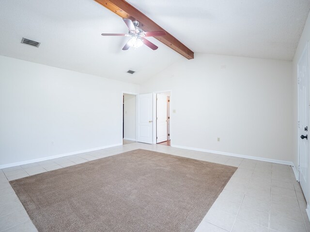 5210 N Northridge Rd, Valdosta, GA 31605 - empty room with visible vents, baseboards, a ceiling fan, light carpet, and vaulted ceiling with beams