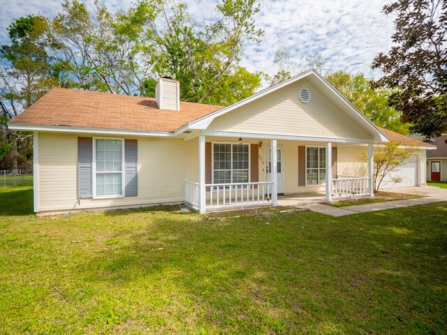 5210 N Northridge Rd, Valdosta, GA 31605 - ranch-style house featuring a chimney, a porch, and a front yard