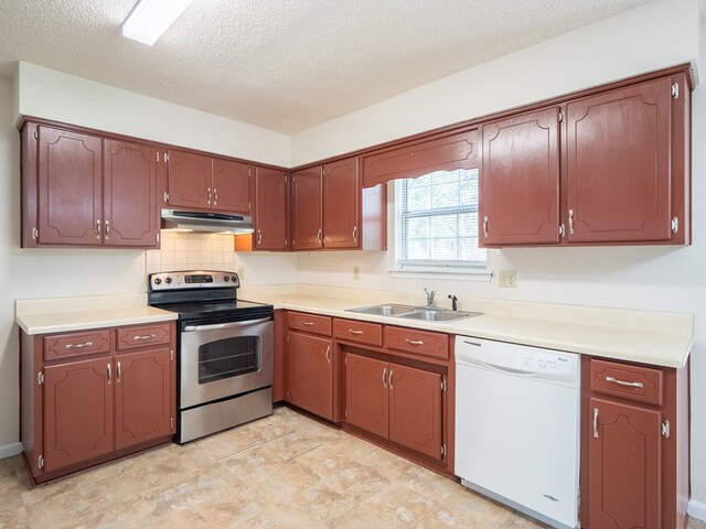 5210 N Northridge Rd, Valdosta, GA 31605 - kitchen featuring light countertops, stainless steel electric range oven, under cabinet range hood, a sink, and white dishwasher