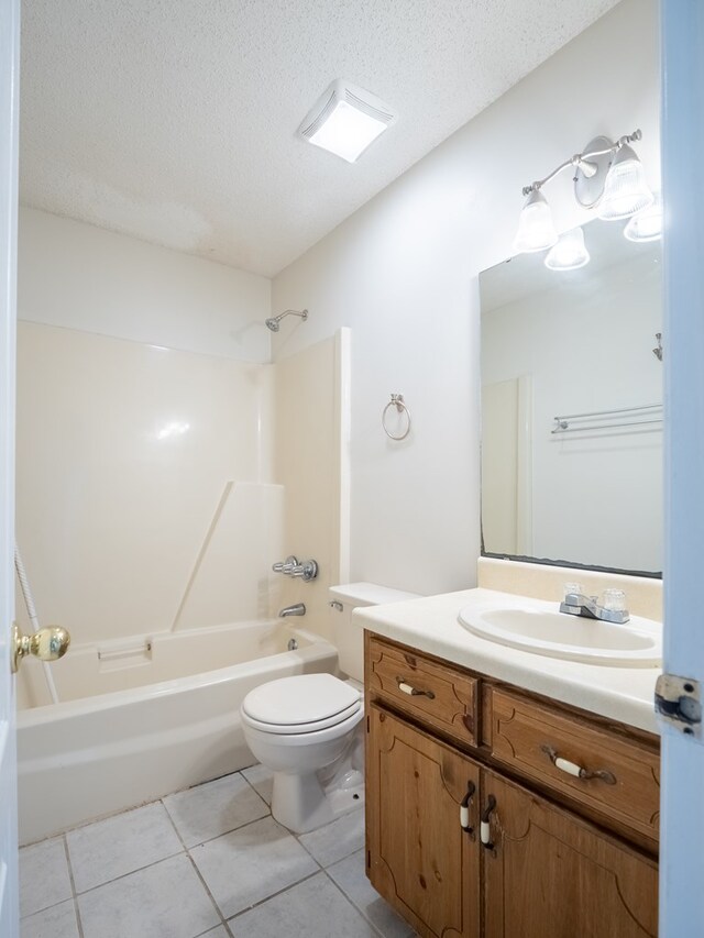 5210 N Northridge Rd, Valdosta, GA 31605 - bathroom featuring a textured ceiling, toilet, tile patterned flooring, and vanity