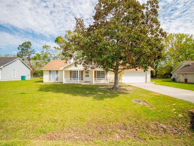 5210 N Northridge Rd, Valdosta, GA 31605 - view of front of house featuring a garage, concrete driveway, a front yard, stucco siding, and covered porch