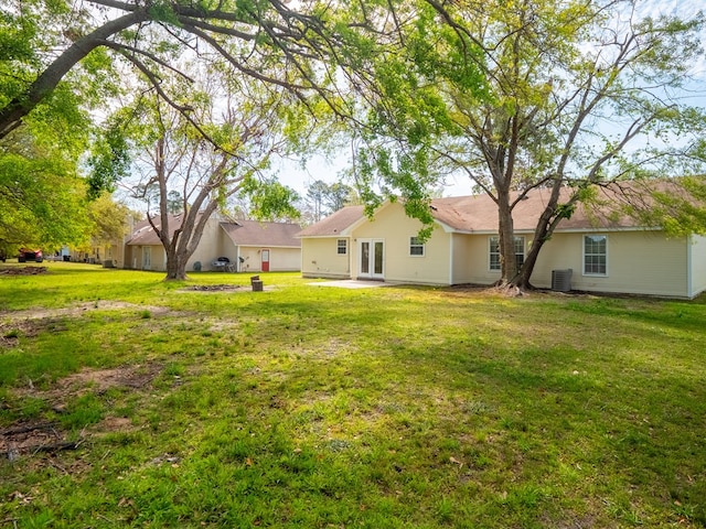 5210 N Northridge Rd, Valdosta, GA 31605 - view of yard with french doors and central AC unit