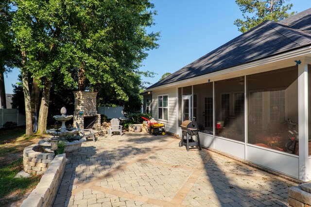 4311 Mossy Creek Rd, Valdosta, GA 31602 - view of patio featuring fence, a sunroom, and a grill