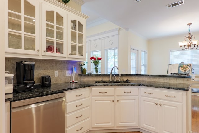 4311 Mossy Creek Rd, Valdosta, GA 31602 - kitchen featuring dishwasher, a sink, ornamental molding, a chandelier, and dark stone countertops