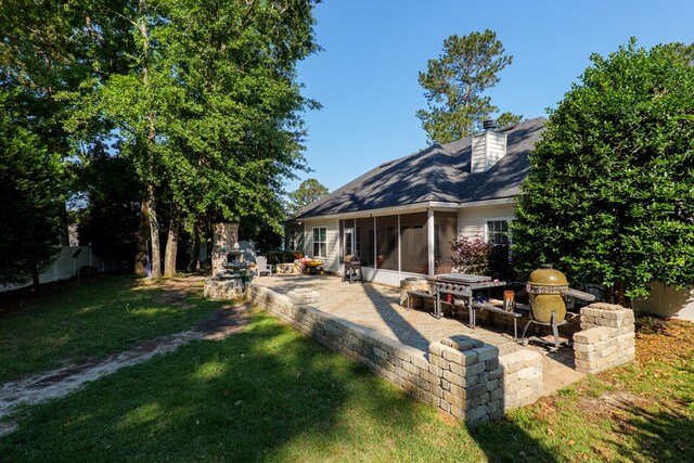 4311 Mossy Creek Rd, Valdosta, GA 31602 - view of yard with a patio and a sunroom