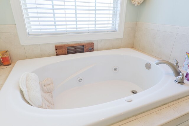4311 Mossy Creek Rd, Valdosta, GA 31602 - bathroom featuring healthy amount of natural light and a jetted tub