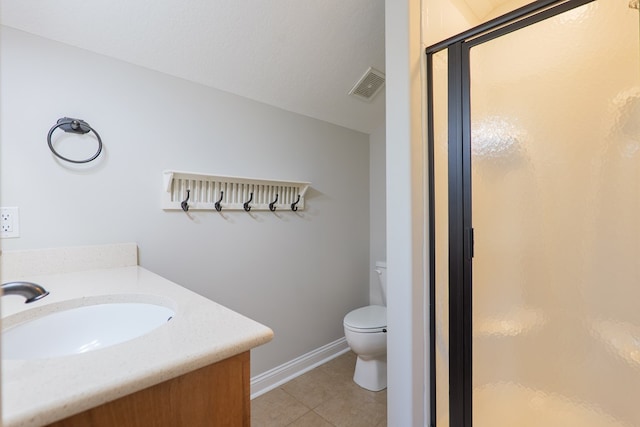 full bathroom featuring tile patterned floors, visible vents, toilet, vanity, and a stall shower