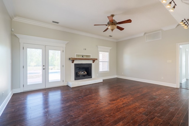 unfurnished living room featuring ornamental molding, a ceiling fan, and visible vents