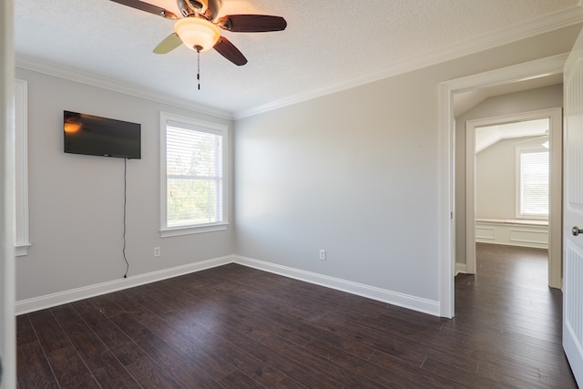 spare room featuring ceiling fan, crown molding, dark wood-type flooring, and a textured ceiling