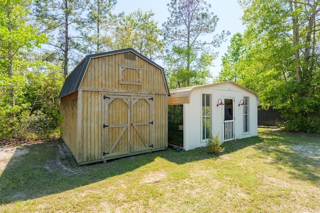 view of shed with fence