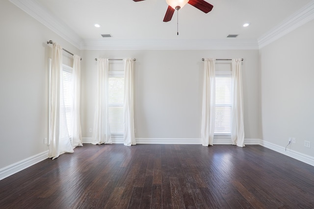 unfurnished room featuring visible vents, ceiling fan, and a healthy amount of sunlight