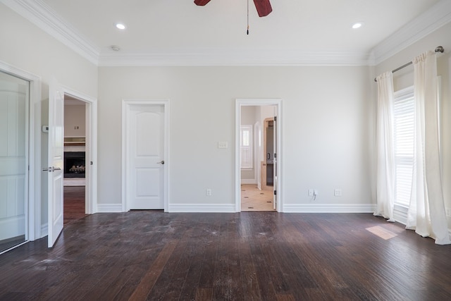 unfurnished bedroom featuring baseboards, recessed lighting, ornamental molding, and wood-type flooring
