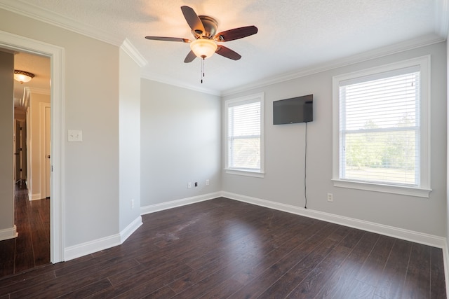 unfurnished room with baseboards, a ceiling fan, dark wood-style floors, and a healthy amount of sunlight