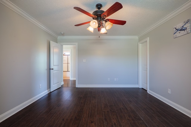 empty room featuring a textured ceiling, a ceiling fan, baseboards, and ornamental molding