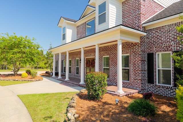 exterior space with brick siding