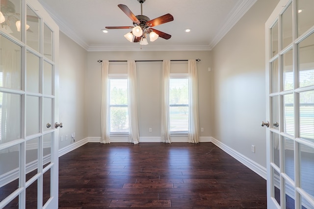 unfurnished room with ceiling fan, french doors, dark wood-type flooring, and ornamental molding