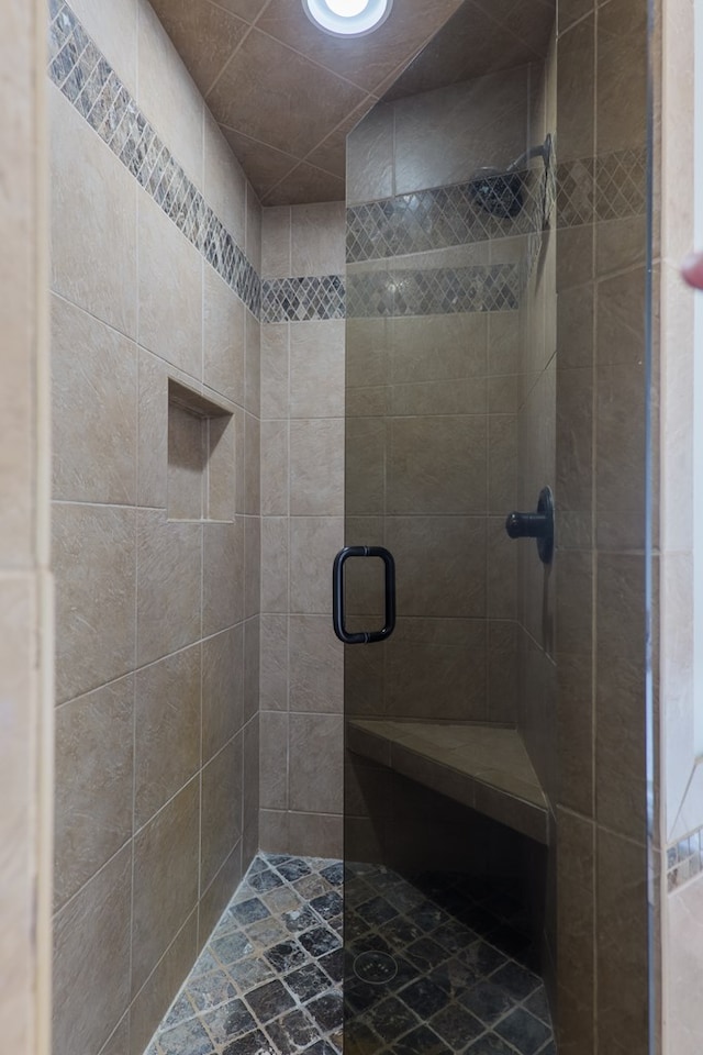 bathroom with a stall shower