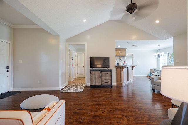 2783 Rabbit Ridge Run, Valdosta, GA 31605 - living area with a chandelier, ceiling fan, dark wood-style flooring, lofted ceiling, and recessed lighting