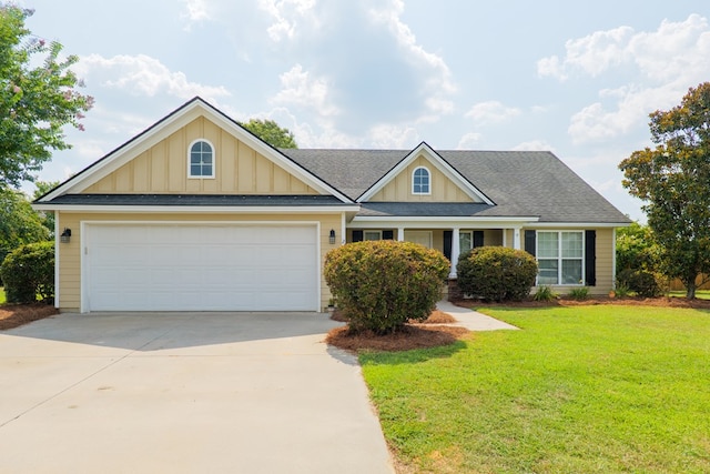 2783 Rabbit Ridge Run, Valdosta, GA 31605 - view of front of home featuring concrete driveway, a front lawn, a garage, and roof with shingles