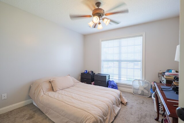 2783 Rabbit Ridge Run, Valdosta, GA 31605 - carpeted bedroom featuring multiple windows and a ceiling fan