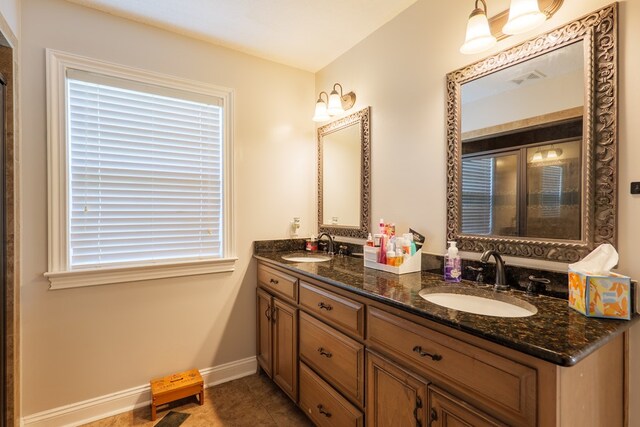 2783 Rabbit Ridge Run, Valdosta, GA 31605 - full bathroom with double vanity and tile patterned flooring