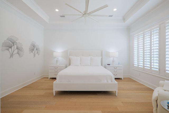 3870 Timber Ridge Rd, Valdosta, GA 31601 - bedroom featuring crown molding, a tray ceiling, light wood-type flooring, recessed lighting, and ceiling fan