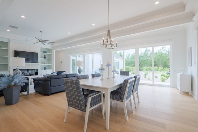 3870 Timber Ridge Rd, Valdosta, GA 31601 - dining area featuring crown molding, light wood-style flooring, a chandelier, ceiling fan, and recessed lighting