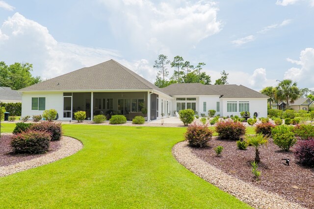 3870 Timber Ridge Rd, Valdosta, GA 31601 - rear view of property with a lawn and a sunroom