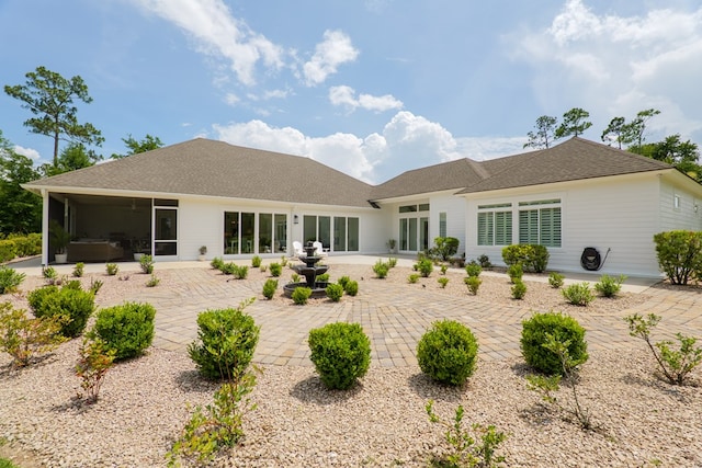3870 Timber Ridge Rd, Valdosta, GA 31601 - rear view of property featuring a patio, a sunroom, and a shingled roof