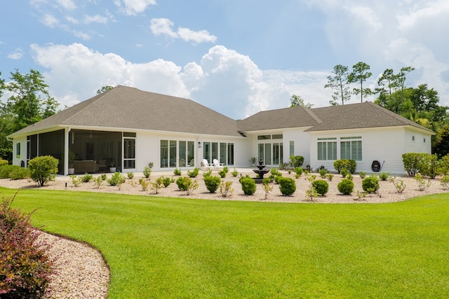 3870 Timber Ridge Rd, Valdosta, GA 31601 - back of property featuring a yard, a sunroom, and a shingled roof