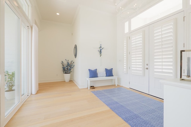 3870 Timber Ridge Rd, Valdosta, GA 31601 - entryway with crown molding, light wood finished floors, and recessed lighting