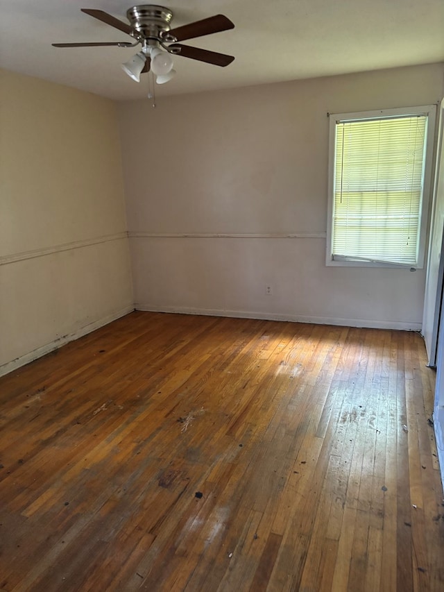 1511 E Moore St, Valdosta, GA 31601 - empty room with hardwood / wood-style floors and a ceiling fan