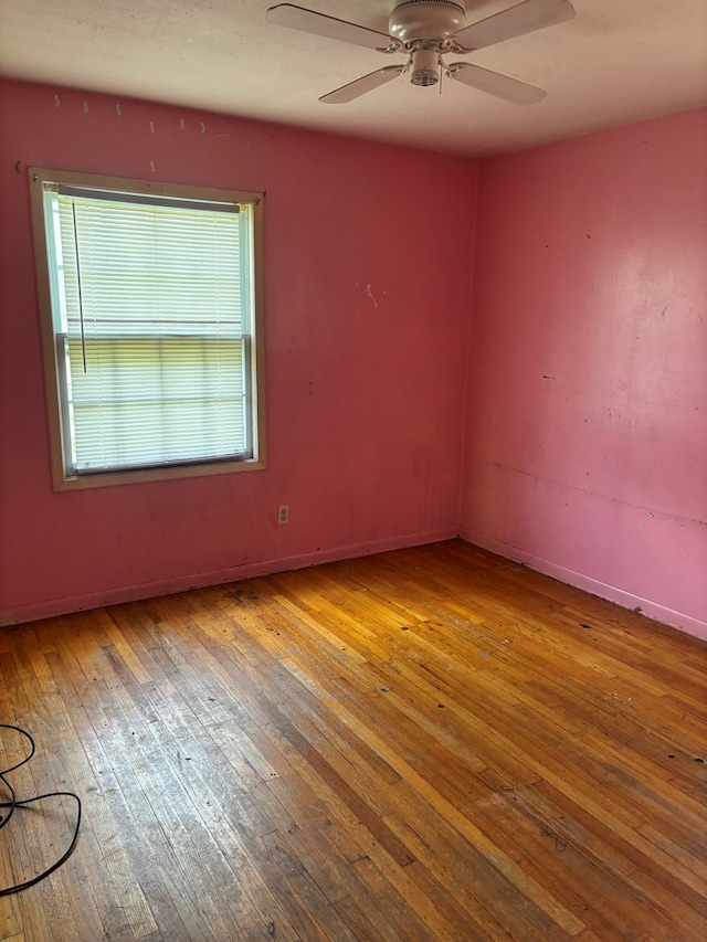 1511 E Moore St, Valdosta, GA 31601 - empty room featuring hardwood / wood-style flooring and ceiling fan