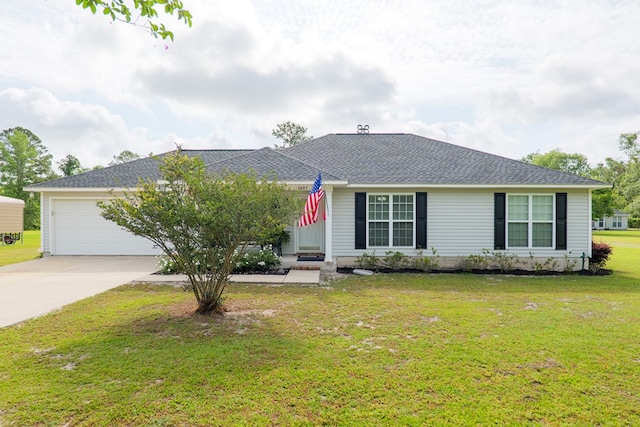 ranch-style house with an attached garage, driveway, and a front yard