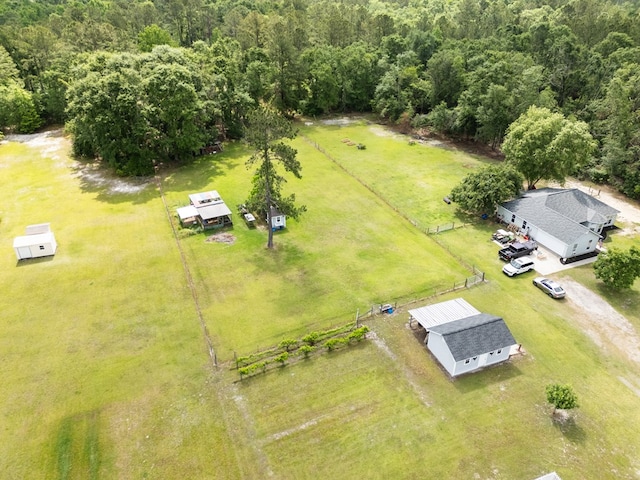 aerial view with a view of trees and a rural view