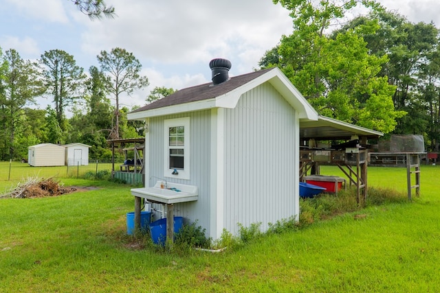 view of shed featuring fence