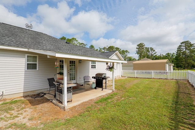 view of yard with a fenced backyard and a patio area